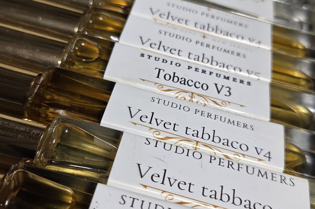 Labeled development vials, versions 1 through 5 of client scents